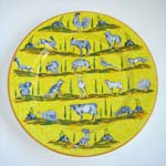 Big round plate animals on yellow